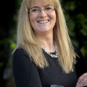Headshot of Professor Aine Carroll